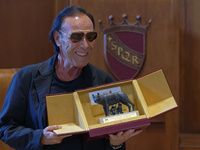 Italian singer-songwriter Antonello Venditti attends the Capitoline Wolf award ceremony inside the Giulio Cesare Hall at the Campidoglio in...