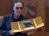 Italian singer-songwriter Antonello Venditti attends the Capitoline Wolf award ceremony inside the Giulio Cesare Hall at the Campidoglio in...