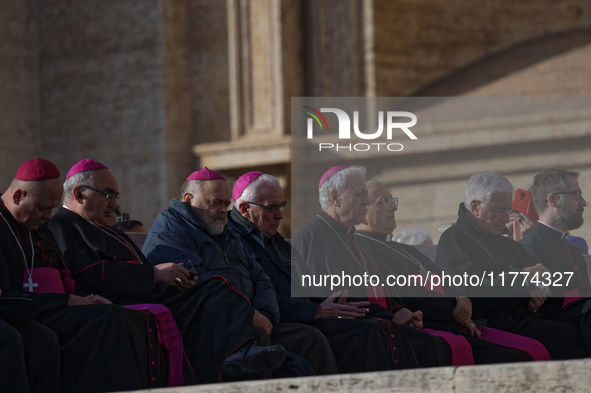 A group of Bishops and Cardinals attends Pope Francis's weekly General Audience in St. Peter's Square at the Vatican on November 13, 2024. 