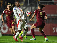 Melchie Dumornay of Olympique Lyonnais and Lucia Di Guglielmo of A.S. Roma Femminile are in action during Group A - Day 3 of the UEFA Women'...