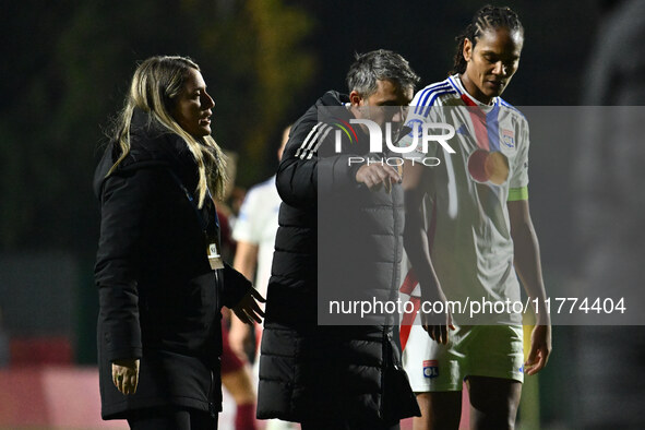 Alessandro Spugna, coach of A.S. Roma Femminile, and Wendie Renard of Olympique Lyonnais are present during Group A - Day 3 of the UEFA Wome...