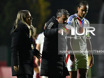 Alessandro Spugna, coach of A.S. Roma Femminile, and Wendie Renard of Olympique Lyonnais are present during Group A - Day 3 of the UEFA Wome...