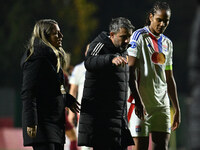 Alessandro Spugna, coach of A.S. Roma Femminile, and Wendie Renard of Olympique Lyonnais are present during Group A - Day 3 of the UEFA Wome...