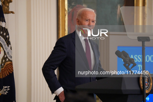 U.S. President Joe Biden listens to first lady Jill Biden speak during the Classroom to Career Summit in the East Room of the White House on...