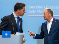 NATO Secretary General Mark Rutte (L) and Polish Prime Minister Donald Tusk (R)  at a press conference after their meeting  in Warsaw, Polan...