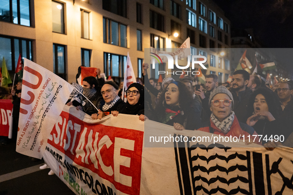 Protesters hold placards and wave Palestinian flags during a rally organized by political parties (La France Insoumise - LFI, Les Ecologiste...