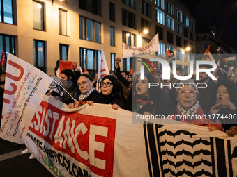 Protesters hold placards and wave Palestinian flags during a rally organized by political parties (La France Insoumise - LFI, Les Ecologiste...