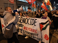 Protesters hold placards and wave Palestinian flags during a rally organized by political parties (La France Insoumise - LFI, Les Ecologiste...