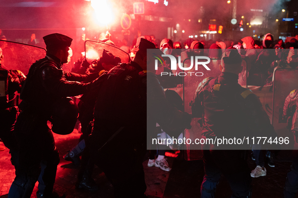 Protestors clash with French gendarmes during a rally organized by political parties (La France Insoumise - LFI, Les Ecologistes - EELV, and...