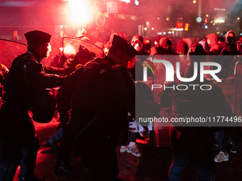 Protestors clash with French gendarmes during a rally organized by political parties (La France Insoumise - LFI, Les Ecologistes - EELV, and...