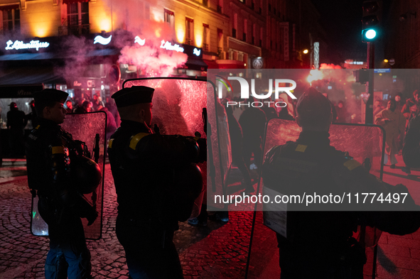 Protestors clash with French gendarmes during a rally organized by political parties (La France Insoumise - LFI, Les Ecologistes - EELV, and...