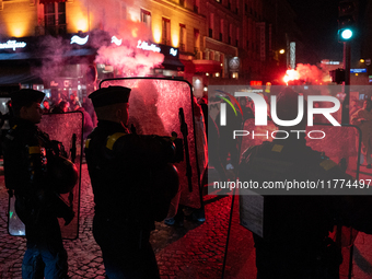 Protestors clash with French gendarmes during a rally organized by political parties (La France Insoumise - LFI, Les Ecologistes - EELV, and...