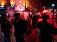 Protestors clash with French gendarmes during a rally organized by political parties (La France Insoumise - LFI, Les Ecologistes - EELV, and...