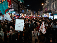 A protester holds a placard reading ''Smotrich assassin'' during a rally organized by political parties (La France Insoumise - LFI, Les Ecol...