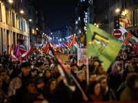 Protesters hold placards and wave Palestinian flags during a rally organized by political parties (La France Insoumise - LFI, Les Ecologiste...