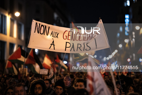 Protesters hold placards and wave Palestinian flags during a rally organized by political parties (La France Insoumise - LFI, Les Ecologiste...