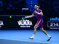 Casper Ruud competes during the Nitto ATP Finals 2024 Group B match against Alexander Zverev at Inalpi Arena in Turin, Italy, on November 13...