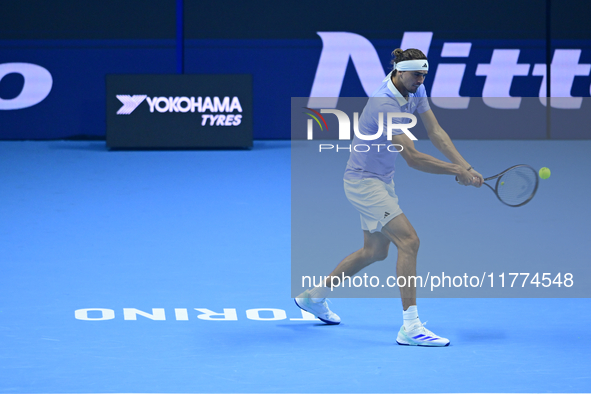 Alexander Zverev competes during the Nitto ATP Finals 2024 Group B match between Casper Ruud and Alexander Zverev at Inalpi Arena in Turin,...