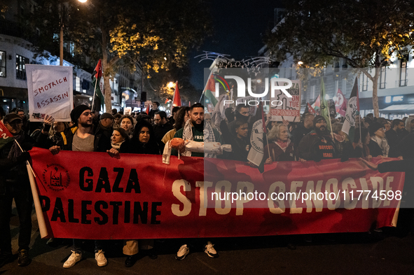 Protesters hold placards and wave Palestinian flags during a rally organized by political parties (La France Insoumise - LFI, Les Ecologiste...