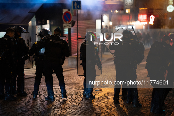 Protestors clash with French gendarmes during a rally organized by political parties (La France Insoumise - LFI, Les Ecologistes - EELV, and...