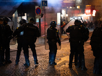 Protestors clash with French gendarmes during a rally organized by political parties (La France Insoumise - LFI, Les Ecologistes - EELV, and...