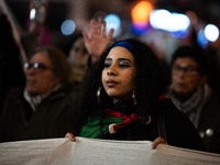 Protesters hold placards and wave Palestinian flags during a rally organized by political parties (La France Insoumise - LFI, Les Ecologiste...