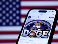 American flag displayed on a laptop screen and Elon Musk post about DOGE on X displayed on a phone screen are seen in this illustration phot...