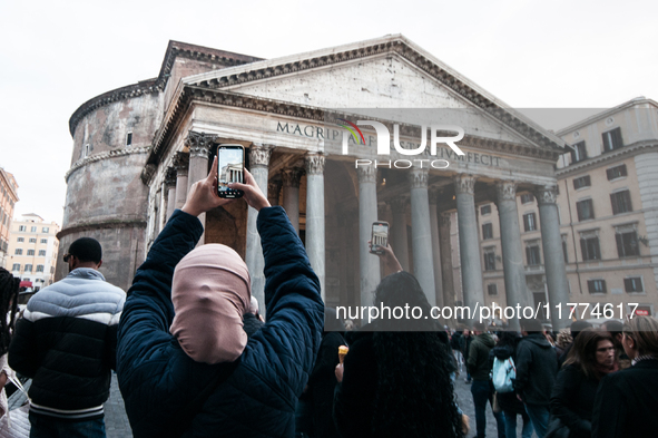 Tourists walk through Piazza del Pantheon in Rome, Italy, on November 13, 2024. The square is partially closed to the public due to renovati...