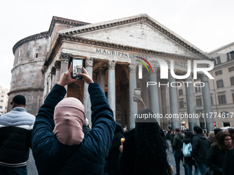 Tourists walk through Piazza del Pantheon in Rome, Italy, on November 13, 2024. The square is partially closed to the public due to renovati...