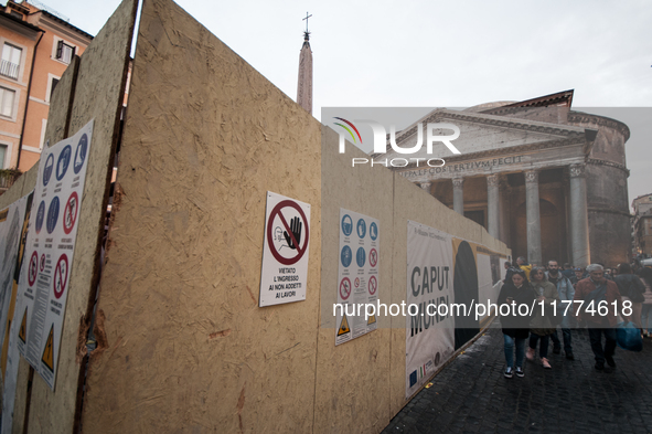 Tourists walk through Piazza del Pantheon in Rome, Italy, on November 13, 2024. The square is partially closed to the public due to renovati...