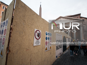 Tourists walk through Piazza del Pantheon in Rome, Italy, on November 13, 2024. The square is partially closed to the public due to renovati...