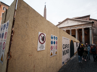 Tourists walk through Piazza del Pantheon in Rome, Italy, on November 13, 2024. The square is partially closed to the public due to renovati...