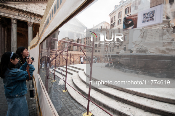 Tourists walk through Piazza del Pantheon in Rome, Italy, on November 13, 2024. The square is partially closed to the public due to renovati...