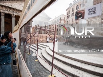 Tourists walk through Piazza del Pantheon in Rome, Italy, on November 13, 2024. The square is partially closed to the public due to renovati...