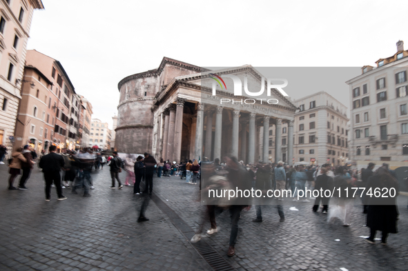 Tourists walk through Piazza del Pantheon in Rome, Italy, on November 13, 2024. The square is partially closed to the public due to renovati...