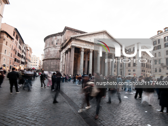 Tourists walk through Piazza del Pantheon in Rome, Italy, on November 13, 2024. The square is partially closed to the public due to renovati...