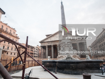 Tourists walk through Piazza del Pantheon in Rome, Italy, on November 13, 2024. The square is partially closed to the public due to renovati...