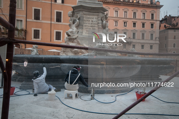 Tourists walk through Piazza del Pantheon in Rome, Italy, on November 13, 2024. The square is partially closed to the public due to renovati...