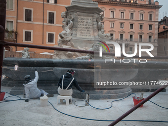 Tourists walk through Piazza del Pantheon in Rome, Italy, on November 13, 2024. The square is partially closed to the public due to renovati...