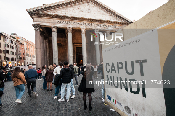 Tourists walk through Piazza del Pantheon in Rome, Italy, on November 13, 2024. The square is partially closed to the public due to renovati...