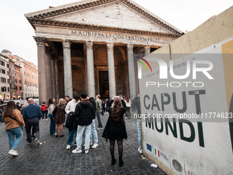 Tourists walk through Piazza del Pantheon in Rome, Italy, on November 13, 2024. The square is partially closed to the public due to renovati...