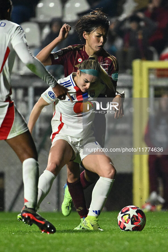 Saki Kumagai of A.S. Roma Femminile and Ellie Carpenter of Olympique Lyonnais are in action during Group A - Day 3 of the UEFA Women's Champ...