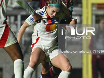 Saki Kumagai of A.S. Roma Femminile and Ellie Carpenter of Olympique Lyonnais are in action during Group A - Day 3 of the UEFA Women's Champ...