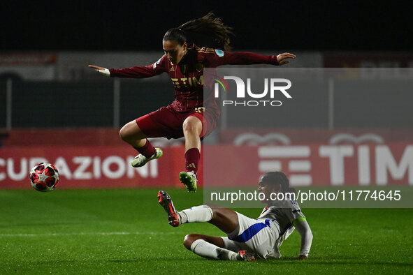 Alice Corelli of A.S. Roma Femminile and Wendie Renard of Olympique Lyonnais are in action during Group A - Day 3 of the UEFA Women's Champi...