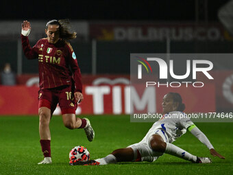 Alice Corelli of A.S. Roma Femminile and Wendie Renard of Olympique Lyonnais are in action during Group A - Day 3 of the UEFA Women's Champi...