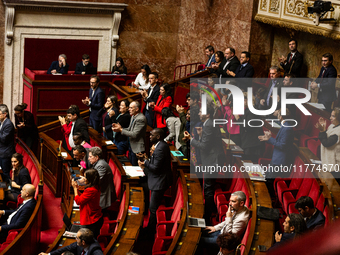 Mps deputies of the left-wing parliamentary group La France Insoumise - Nouveau Front Populaire are seen during the session of questions to...