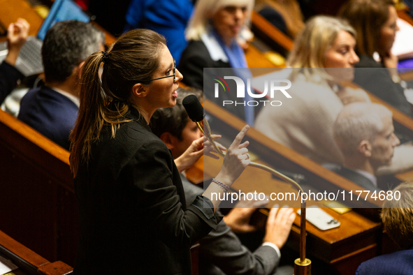 Aurore Berge, deputy of the Ensemble pour la Republique (EPR) government party, speaks during the public session of questions to the French...