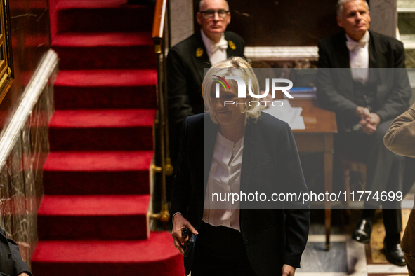 Marine Le Pen, president of the Rassemblement National, RN, formerly known as the Front National, leaves the National Assembly during the se...