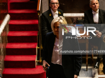 Marine Le Pen, president of the Rassemblement National, RN, formerly known as the Front National, leaves the National Assembly during the se...