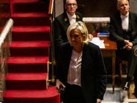 Marine Le Pen, president of the Rassemblement National, RN, formerly known as the Front National, leaves the National Assembly during the se...